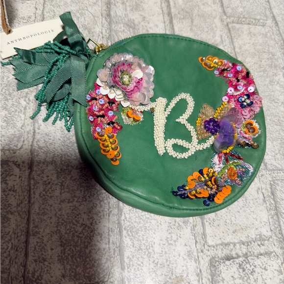 Anthropologie Handbags - Anthropologie Green Floral Sequin Pouch B new